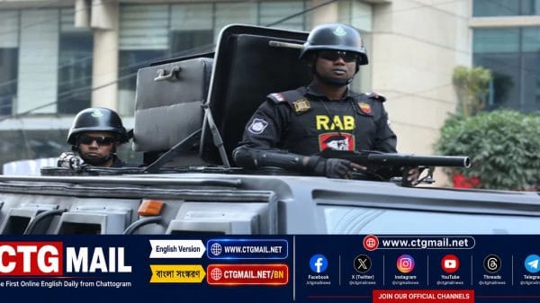 RAB members present arrested suspects in connection with the attack on Digital Dot Net in Chattogram.