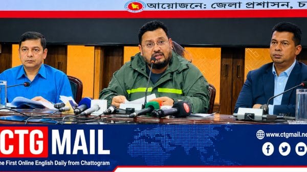 State Minister Mir Helal speaks at a press briefing in Chattogram, urging people to leave high-risk hill settlements as heavy rain increases the risk of landslides.