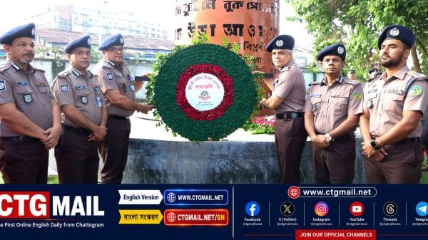 CMP Commissioner Hasan Mohammad Shawkat Ali laying wreath at July Memorial in Chattogram