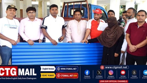 UNO Md Ruhul Amin attends the roofing sheet distribution programme organised by Khulshi Ispahani Hills Welfare Association in Banshkhali.